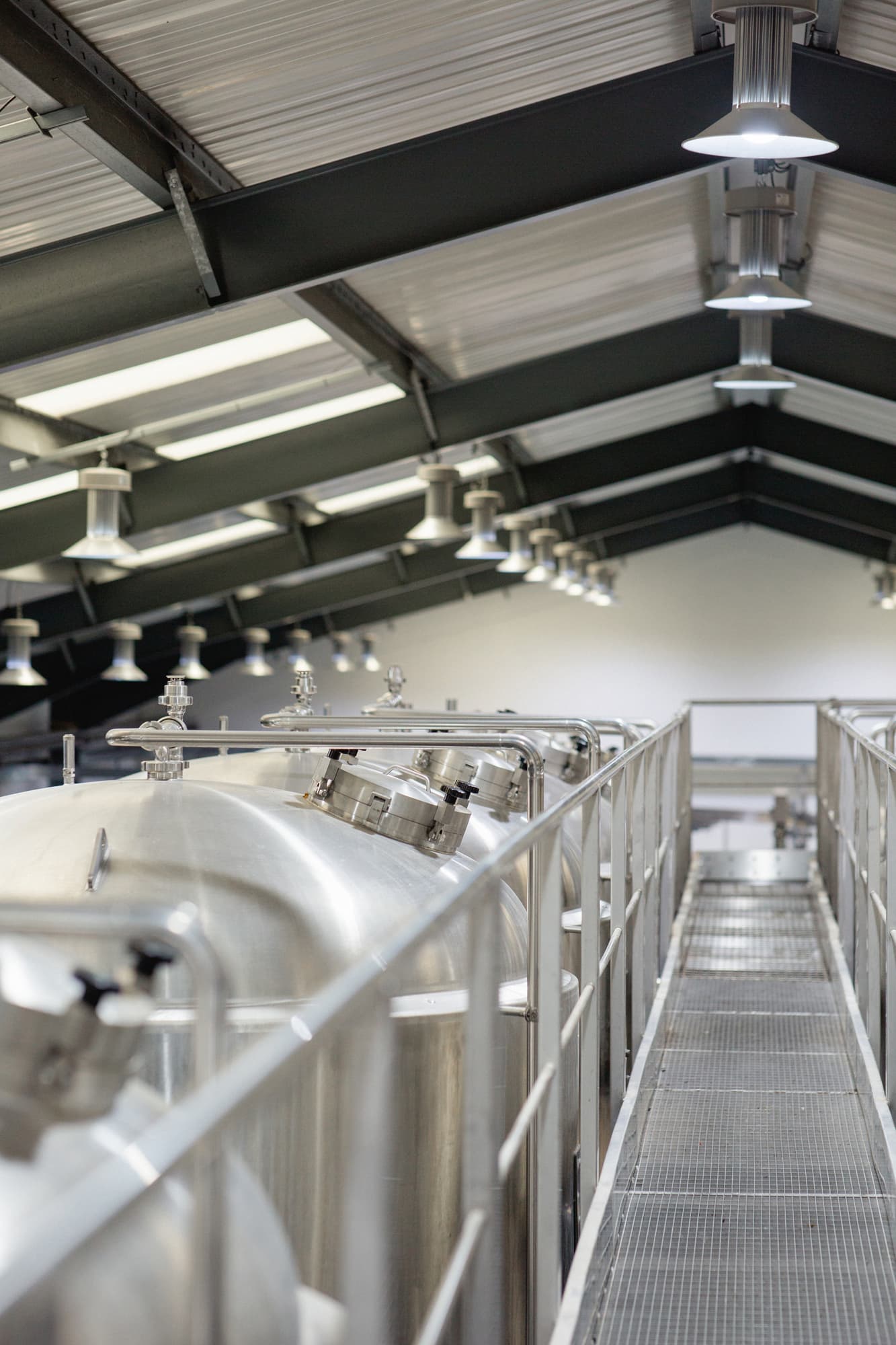 Inside the Riverside Brewery showing tanks for Brewing