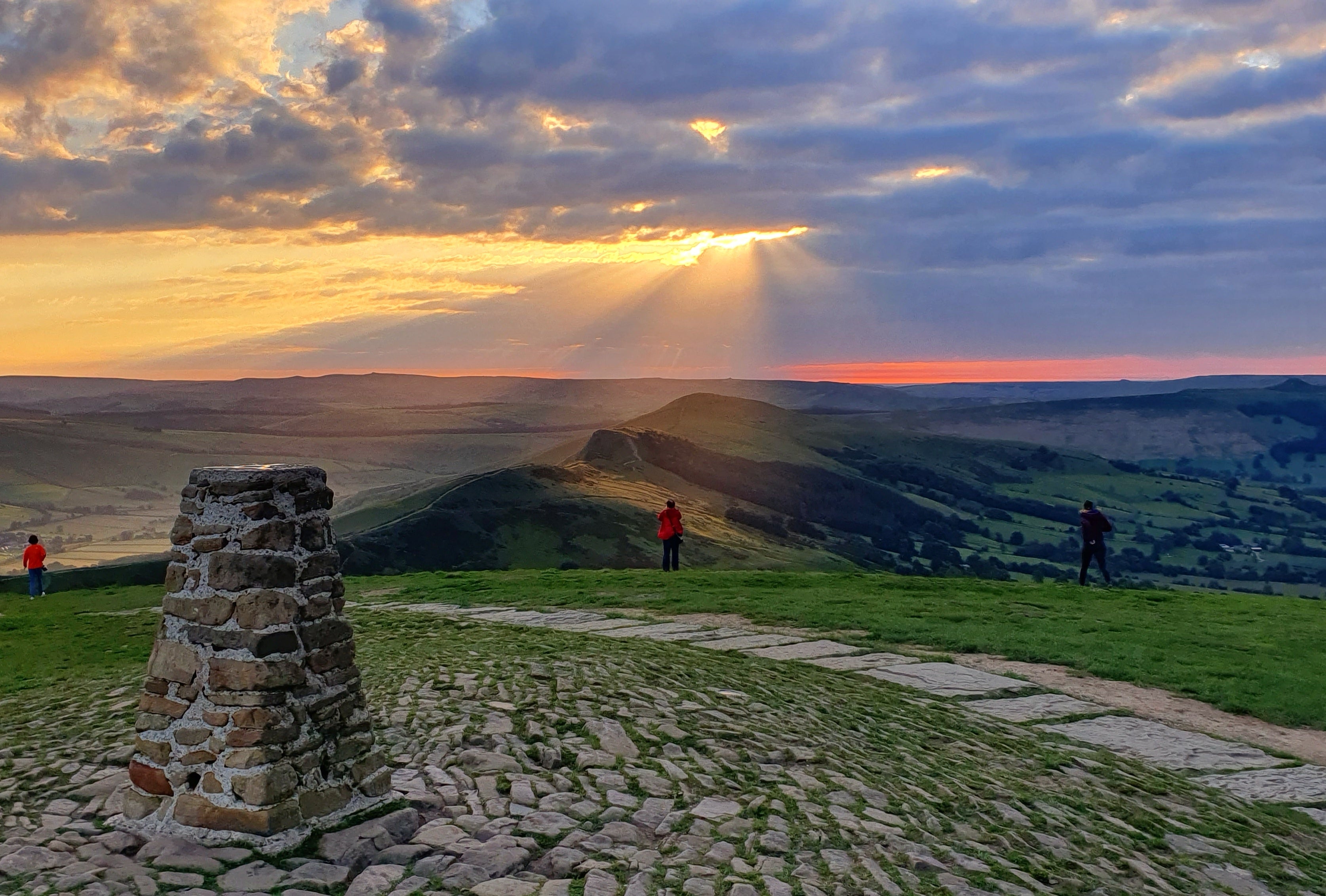 Image of sun coming out between the clouds the Peak district national park