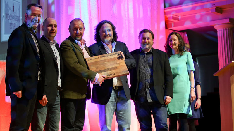 On stage being presented for the BBC Food and Farming Awards for best drink producer