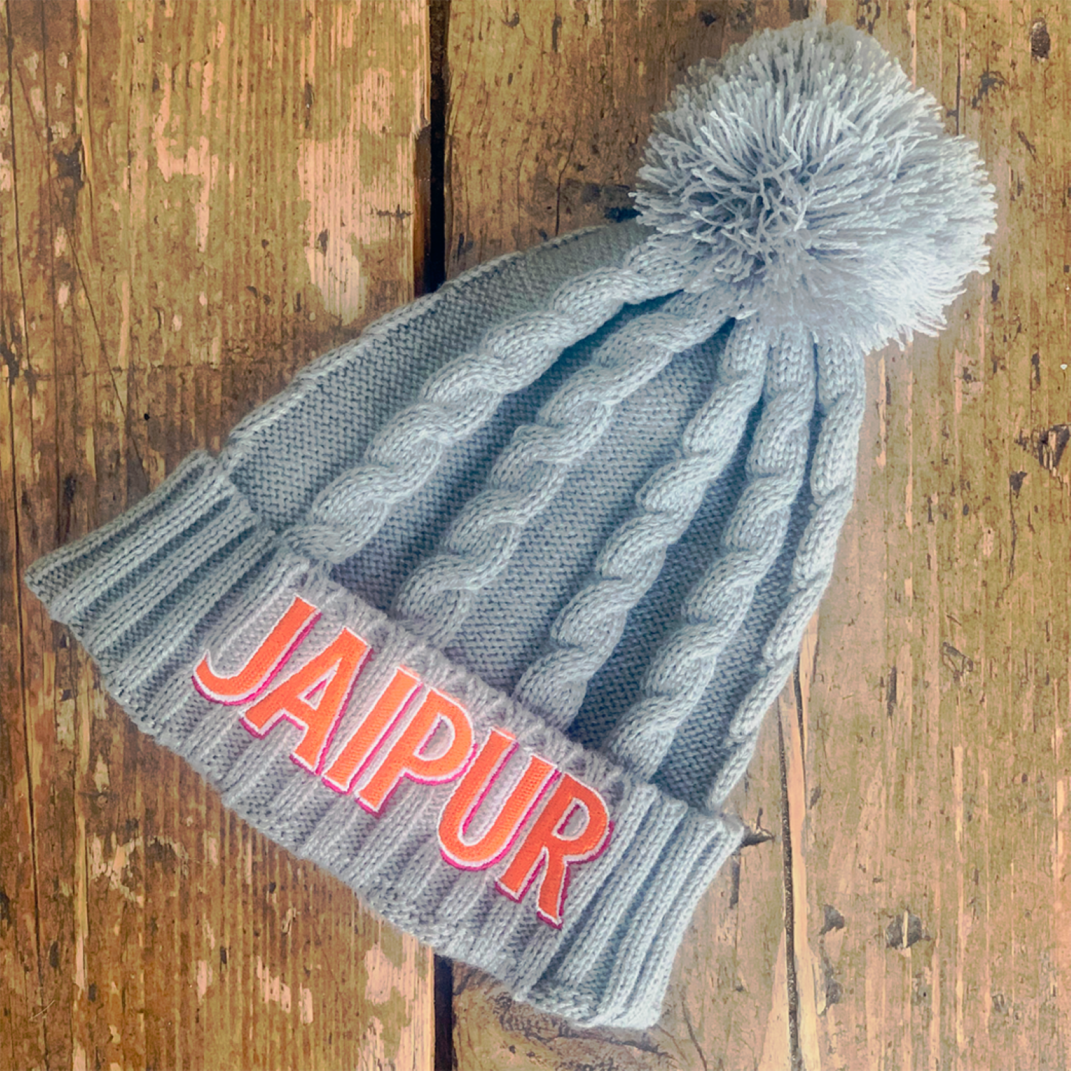 Jaipur cable knit bobble hat Merchandise Thornbridge